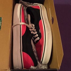 Black and Pink low top Vans